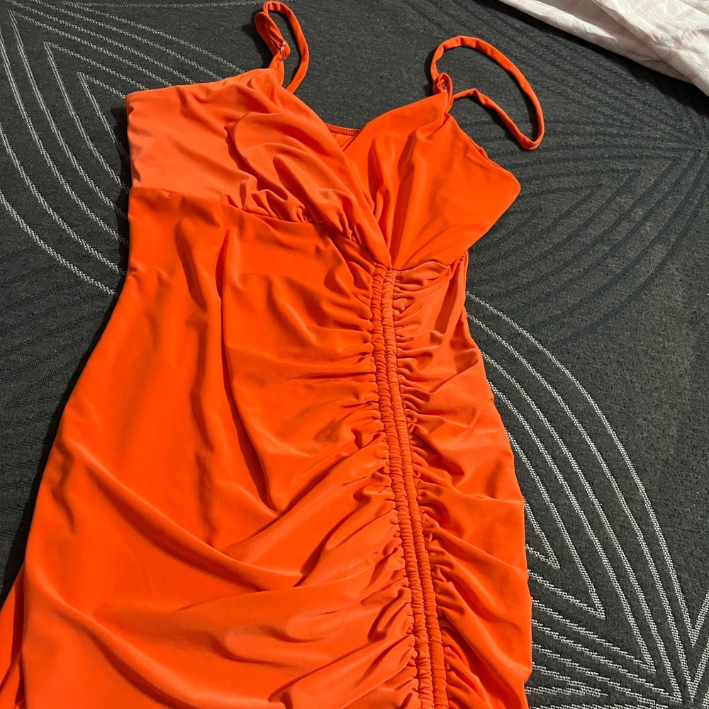 A short orange dress